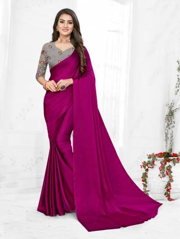 Adorn The Pretty Angelic Look Wearing This Heavy Wevon Designer Saree In Fancy Color Paired With Contrasting Grey Colored Blouse. This Saree Is Fabricated On Chiffon Paired With Micro Fabricated Blouse. Its Pretty Color Pallete Will Give An Attractive Look To Your Personality. 