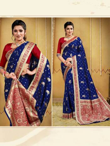 Garb This Pretty Angelic Look Wearing This Heavy Wevon Jacquard Designer Saree In Fine Color Paired With Contrasted Colored Blouse. This Saree Is Fabricated On Banarasi Silk Paired With Blouse. Its Pretty Color Pallete Will Give An Attractive Look To Your Personality. 