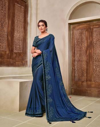 Rich Look This Pretty Elegant Looking Designer Party Wear Saree In Fine Color Paired With Contrasted Colored Blouse. This Saree And Blouse Are Heavy Silk Based With Designer Fiol Printed With Embroidery Work Beautified Saree. Buy Now.