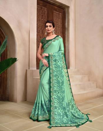 Rich Look This Pretty Elegant Looking Designer Party Wear Saree In Fine Color Paired With Contrasted Colored Blouse. This Saree And Blouse Are Heavy Silk Based With Designer Fiol Printed With Embroidery Work Beautified Saree. Buy Now.