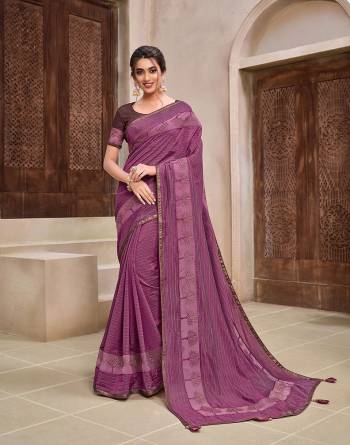 Rich Look This Pretty Elegant Looking Designer Party Wear Saree In Fine Color Paired With Contrasted Colored Blouse. This Saree And Blouse Are Heavy Silk Based With Designer Fiol Printed With Embroidery Work Beautified Saree. Buy Now.