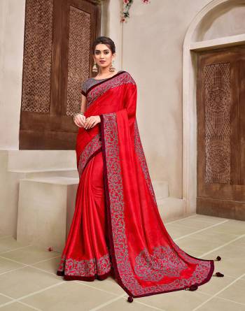 Rich Look This Pretty Elegant Looking Designer Party Wear Saree In Fine Color Paired With Contrasted Colored Blouse. This Saree And Blouse Are Heavy Silk Based With Designer Fiol Printed With Embroidery Work Beautified Saree. Buy Now.