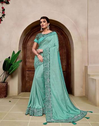 Rich Look This Pretty Elegant Looking Designer Party Wear Saree In Fine Color Paired With Contrasted Colored Blouse. This Saree And Blouse Are Heavy Silk Based With Designer Fiol Printed With Embroidery Work Beautified Saree. Buy Now.