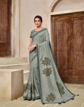 Rich Look This Pretty Elegant Looking Designer Party Wear Saree In Fine Color Paired With Contrasted Colored Blouse. This Saree And Blouse Are Heavy Silk Based With Designer Fiol Printed With Embroidery Work Beautified Saree. Buy Now.