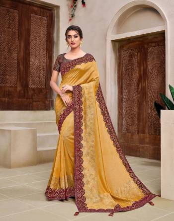 Rich Look This Pretty Elegant Looking Designer Party Wear Saree In Fine Color Paired With Contrasted Colored Blouse. This Saree And Blouse Are Heavy Silk Based With Designer Fiol Printed With Embroidery Work Beautified Saree. Buy Now.