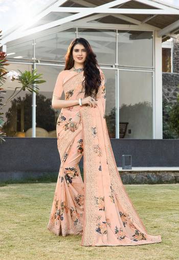 Rich Look This Pretty Elegant Looking Designer Party Wear Saree In Fine Light Color Paired With Blouse. This Saree Are Satin Silk And Blouse Are Banlori Silk With Digital Printed,Multy Embroidery,Swaroski Stone Work With  Embroidery Work Blouse Beautified Saree. Buy Now.