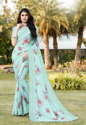 Rich Look This Pretty Elegant Looking Designer Party Wear Saree In Fine Light Color Paired With Blouse. This Saree Are Satin Silk And Blouse Are Banlori Silk With Digital Printed,Multy Embroidery,Swaroski Stone Work With  Embroidery Work Blouse Beautified Saree. Buy Now.