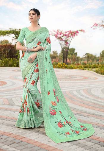 Rich Look This Pretty Elegant Looking Designer Party Wear Saree In Fine Light Color Paired With Blouse. This Saree Are Satin Silk And Blouse Are Banlori Silk With Digital Printed,Multy Embroidery,Swaroski Stone Work With  Embroidery Work Blouse Beautified Saree. Buy Now.