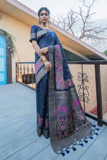  Garb This Pretty Elegant Looking Designer Party Wear Saree In Dusty Color Paired With Blouse. This Saree And Blouse Are Tussar Silk Based With Heavy Designer Wevon Work Beautified Saree. Buy Now.