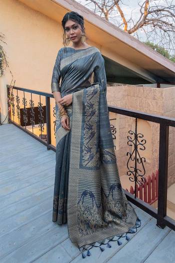  Garb This Pretty Elegant Looking Designer Party Wear Saree In Dusty Color Paired With Blouse. This Saree And Blouse Are Tussar Silk Based With Heavy Designer Wevon Work Beautified Saree. Buy Now.