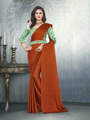 Grab This Pretty Elegant Looking Designer Saree In Fine Color Paired With Contrasting Colored Blouse. This Saree Are Black Rangoli And Blouse Are Satin Based Beautified With Digital Printed,Embroidery And Diamond Work In Blouse. Buy Now.