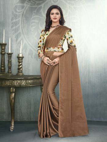 Grab This Pretty Elegant Looking Designer Saree In Fine Color Paired With Contrasting Colored Blouse. This Saree Are Black Rangoli And Blouse Are Satin Based Beautified With Digital Printed,Embroidery And Diamond Work In Blouse. Buy Now.