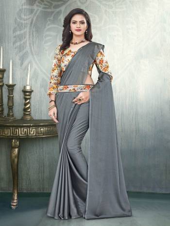 Grab This Pretty Elegant Looking Designer Saree In Fine Color Paired With Contrasting Colored Blouse. This Saree Are Black Rangoli And Blouse Are Satin Based Beautified With Digital Printed,Embroidery And Diamond Work In Blouse. Buy Now.