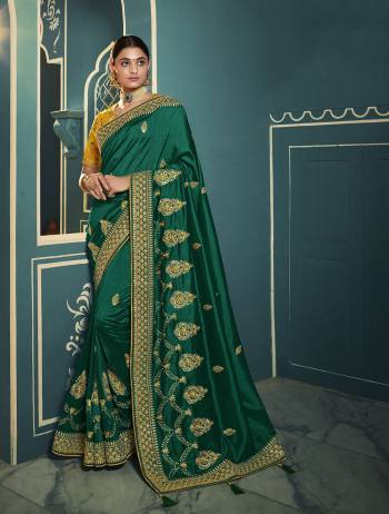 Adorn The Pretty Angelic Look Wearing This Heavy Designer Saree In Fine Color Paired With Contrasting Colored Blouse. This Saree Is Fabricated On Chiffon Paired With Art Silk Fabricated Blouse. Its Pretty Color Pallete Will Give An Attractive Look To Your Personality. 