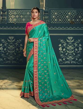 Adorn The Pretty Angelic Look Wearing This Heavy Designer Saree In Fine Color Paired With Contrasting Colored Blouse. This Saree Is Fabricated On Chiffon Paired With Art Silk Fabricated Blouse. Its Pretty Color Pallete Will Give An Attractive Look To Your Personality. 