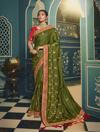 Adorn The Pretty Angelic Look Wearing This Heavy Designer Saree In Fine Color Paired With Contrasting Colored Blouse. This Saree Is Fabricated On Chiffon Paired With Art Silk Fabricated Blouse. Its Pretty Color Pallete Will Give An Attractive Look To Your Personality. 