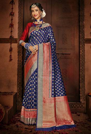 Look Attractive Wearing This Saree Colored Saree Paired With Contrasting Colored Blouse.  This Wevon Designer Saree Is Art Silk Based Which Gives A Rich Look To Your Personality. Buy This Pretty Saree Now.