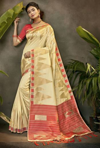 Celebrate This Festive Season In This Very Pretty Cream Colored Designer Saree Paired With Contrasting Colored Blouse. This Saree and Blouse Are Art Silk Based Beautified With Detailed Wevon Jari Designer Work. 