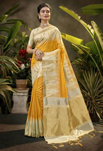 Celebrate This Festive Season In This Very Pretty Light Colored Designer Saree Paired With Contrasting Cream Colored Blouse. This Saree and Blouse Are Art Silk Based Beautified With Detailed Wevon Jari Designer Work. 