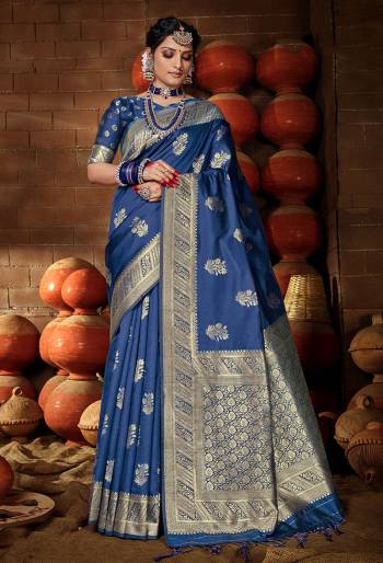 Grab This Pretty Elegant Looking Designer Saree In Dark Color Paired With Blouse. This Saree And Blouse Are Banarasi Silk Based Beautified With Weving Jari Jacquard Work. Buy Now.