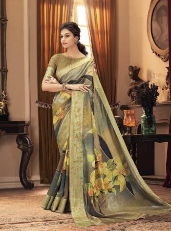 Grab This Pretty Elegant Looking Designer Saree In Dusty Color Paired With Blouse. This Saree And Blouse Are Chiffon Based Beautified With Wevon Designer With Digital Printed And Embroidery. Buy Now.