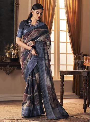 Grab This Pretty Elegant Looking Designer Saree In Dusty Color Paired With Blouse. This Saree And Blouse Are Chiffon Based Beautified With Wevon Designer With Digital Printed And Embroidery. Buy Now.