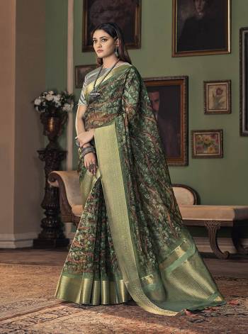 Grab This Pretty Elegant Looking Designer Saree In Dusty Color Paired With Blouse. This Saree And Blouse Are Chiffon Based Beautified With Wevon Designer With Digital Printed And Embroidery. Buy Now.