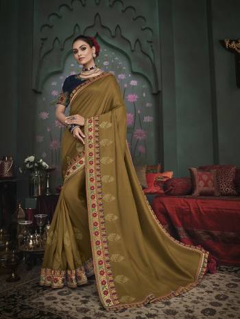 Adorn The Pretty Angelic Look Wearing This Heavy Designer Saree In Fine Color Paired With Blouse. This Saree Is Fabricated On Art Silk Paired With Art Silk Fabricated Blouse Are Heavy Designer Embroidered . Its Pretty Color Pallete Will Give An Attractive Look To Your Personality. 