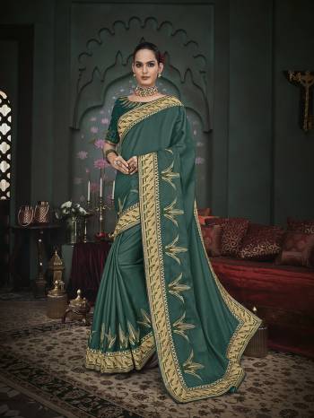 Adorn The Pretty Angelic Look Wearing This Heavy Designer Saree In Fine Color Paired With Blouse. This Saree Is Fabricated On Art Silk Paired With Art Silk Fabricated Blouse Are Heavy Designer Embroidered . Its Pretty Color Pallete Will Give An Attractive Look To Your Personality. 