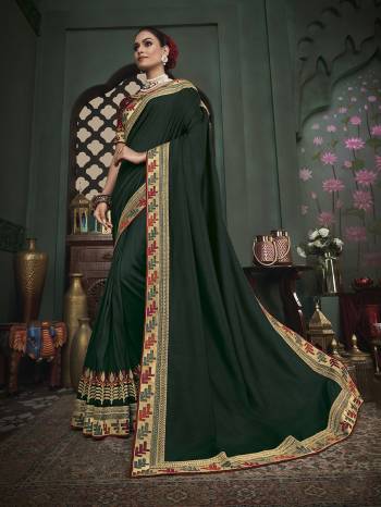 Adorn The Pretty Angelic Look Wearing This Heavy Designer Saree In Fine Color Paired With Blouse. This Saree Is Fabricated On Art Silk Paired With Art Silk Fabricated Blouse Are Heavy Designer Embroidered . Its Pretty Color Pallete Will Give An Attractive Look To Your Personality. 