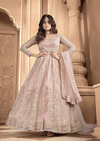 Attrective Look Pretty This Designer Long Length Suit In Lovely Light Color.?Its Pretty Heavy Designer Embroidred Back n Frount Work Top Is Butterfly Net Based Paired With Silk Satin Bottom And Butterfly Net Fabricated Dupatta Which Gives An Attractive To The Suit.