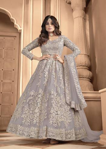 Attrective Look Pretty This Designer Long Length Suit In Lovely Light Color.?Its Pretty Heavy Designer Embroidred Back n Frount Work Top Is Butterfly Net Based Paired With Silk Satin Bottom And Butterfly Net Fabricated Dupatta Which Gives An Attractive To The Suit.