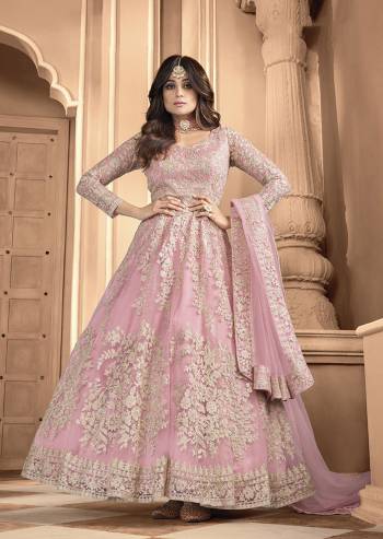 Attrective Look Pretty This Designer Long Length Suit In Lovely Light Color.?Its Pretty Heavy Designer Embroidred Back n Frount Work Top Is Butterfly Net Based Paired With Silk Satin Bottom And Butterfly Net Fabricated Dupatta Which Gives An Attractive To The Suit.