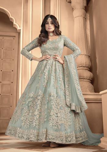 Attrective Look Pretty This Designer Long Length Suit In Lovely Light Color.?Its Pretty Heavy Designer Embroidred Back n Frount Work Top Is Butterfly Net Based Paired With Silk Satin Bottom And Butterfly Net Fabricated Dupatta Which Gives An Attractive To The Suit.