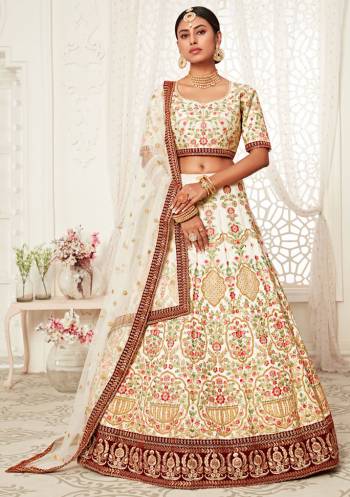 Garb This Heavy Designer Lehenga Choli In All Over Color. This Heavy Embroidered Lehenga Choli Is Art Silk Based Paired With Soft Net Fabricated Dupatta, It Is Beautified With Lovely Detailed Heavy Embroidery Giving An Attractive Look.