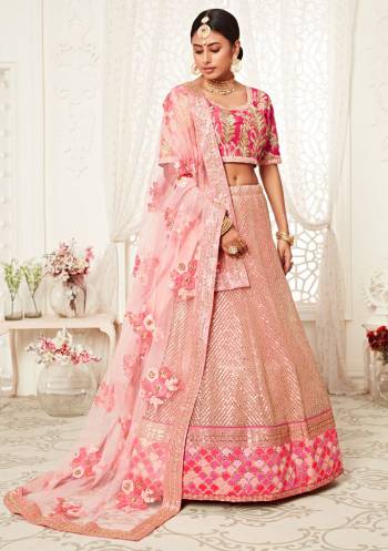 Garb This Heavy Designer Lehenga Choli In All Over Color. This Heavy Embroidered Lehenga Choli Is Soft Net Based Paired With Soft Net Fabricated Dupatta, It Is Beautified With Lovely Detailed Heavy Embroidery Giving An Attractive Look.