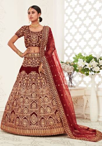 Garb This Heavy Designer Lehenga Choli In All Over Color. This Heavy Embroidered Lehenga Choli Is Velvet Based Paired With Soft Net Fabricated Dupatta, It Is Beautified With Lovely Detailed Heavy Embroidery Giving An Attractive Look.