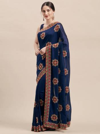 Celebrate This Festive Season In This Very Pretty Nevy Blue Colored Designer Saree Paired With Blouse. This Saree and Blouse Are Vichitra Silk Based Beautified With Detailed Heavy Deasigner Embroidery With Ston Work. 