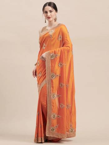 Celebrate This Festive Season In This Very Pretty Orange Colored Designer Saree Paired With Blouse. This Saree and Blouse Are Vichitra Silk Based Beautified With Detailed Heavy Deasigner Embroidery With Stone Work. 