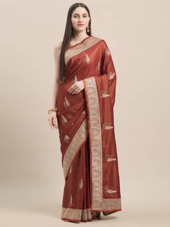 Celebrate This Festive Season In This Very Pretty Rust Brown Colored Designer Saree Paired With Blouse. This Saree Are Satin Silk and Blouse Are Banglori Silk Based Beautified With Detailed Heavy Deasigner Embroidery With Swarovski Work. 