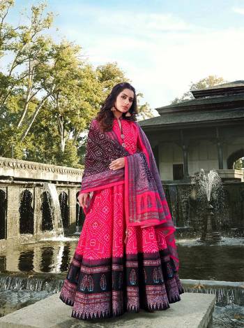 Attrective Look Your Rich And Elegant Taste Wearing This Designer Readymade Long Gown In Pink Color And Dupatta Are Brown Color. This  Pretty Gown Is Fabricated On Killer Silk And Dupatta Are Jacquard Based Beautified With Designer Digital Printed With Cotton Leggings. Its Fabric Is Soft Towards Skin And Easy To Carry All Day Long. 