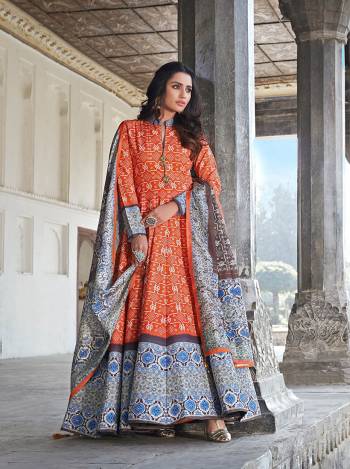 Attrective Look Your Rich And Elegant Taste Wearing This Designer Readymade Long Gown In Orange Color And Dupatta Are Blue Color. This  Pretty Gown Is Fabricated On Killer Silk And Dupatta Are Jacquard Based Beautified With Designer Digital Printed With Cotton Leggings. Its Fabric Is Soft Towards Skin And Easy To Carry All Day Long. 