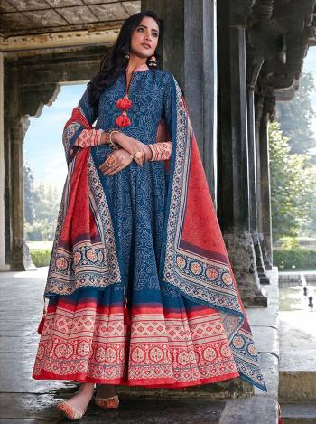 Attrective Look Your Rich And Elegant Taste Wearing This Designer Readymade Long Gown In Blue Color And Dupatta Are Tamato Color. This  Pretty Gown Is Fabricated On Killer Silk And Dupatta Are Jacquard Based Beautified With Designer Digital Printed With Cotton Leggings. Its Fabric Is Soft Towards Skin And Easy To Carry All Day Long. 