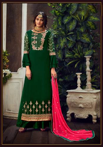 Attrective Look The Upcoming Festive And Wedding Season With This Designer Suit In Green Color Paired With Dupatta. Its Heacy Embroidered Top Is Fabricated On Georgette Paired With Santoon Bottom And Chiffon Fabricated Dupatta. Buy this Suit Now.