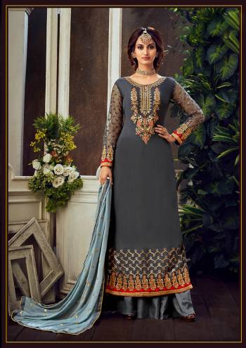 Attrective Look The Upcoming Festive And Wedding Season With This Designer Suit In Grey Color Paired With Dupatta. Its Heacy Embroidered Top Is Fabricated On Georgette Paired With Santoon Bottom And Chiffon Fabricated Dupatta. Buy this Suit Now.