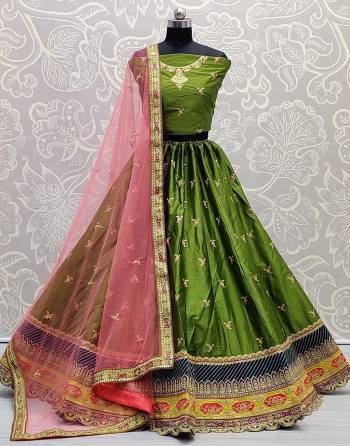 Attrective Look  Heavy Designer Lehenga Choli In Fine Color. This Heavy Embroidered Lehenga Choli Is Satin Silk Based Paired With Soft Net Fabricated Dupatta, It Is Beautified With Lovely Detailed Thread,Dori,Sequance Embroidery Giving An Attractive Look.