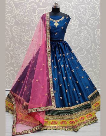 Attrective Look  Heavy Designer Lehenga Choli In Fine Color. This Heavy Embroidered Lehenga Choli Is Satin Silk Based Paired With Soft Net Fabricated Dupatta, It Is Beautified With Lovely Detailed Thread,Dori,Sequance Embroidery Giving An Attractive Look.