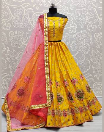 Attrective Look  Heavy Designer Lehenga Choli In Fine Color. This Heavy Embroidered Lehenga Choli Is Satin Silk Based Paired With Soft Net Fabricated Dupatta, It Is Beautified With Lovely Detailed Thread,Sequance,Mirror Embroidery Giving An Attractive Look.