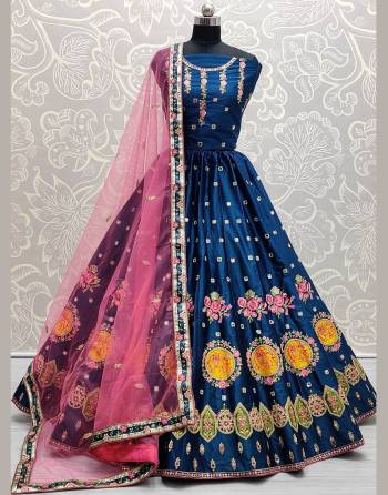 Attrective Look  Heavy Designer Lehenga Choli In Fine Color. This Heavy Embroidered Lehenga Choli Is Satin Silk Based Paired With Soft Net Fabricated Dupatta, It Is Beautified With Lovely Detailed Thread,Sequance,Mirror Embroidery Giving An Attractive Look.