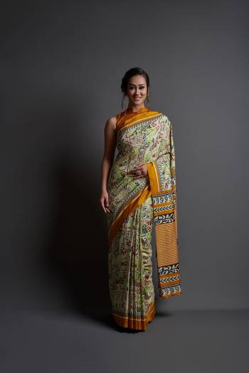 Grab This Pretty Elegant Looking Designer Party Wear Saree In Dark Color Paired With Blouse. This Saree And Blouse Are Dola Silk Based With Designer Printed Beautified Saree. Buy Now.